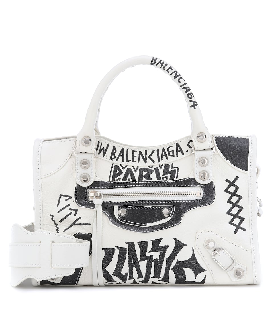 Click to view more detailed imagery on our partner's website Balenciaga Borsa Mini City In Pelle Con Stampa Graffiti In White