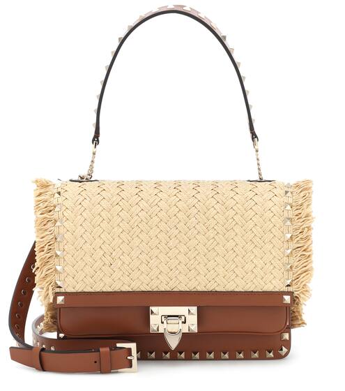Valentino Garavani Rockstud raffia and leather shoulder bag | Valentino